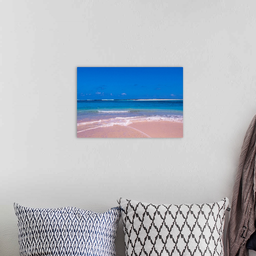 A bohemian room featuring Pink sand beach at Conch Bay, Cat Island, Bahamas.