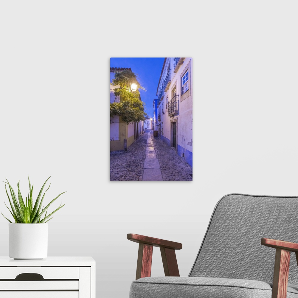 A modern room featuring Portugal, Obidos, Cobblestone Street in the Historic Center at Dawn.