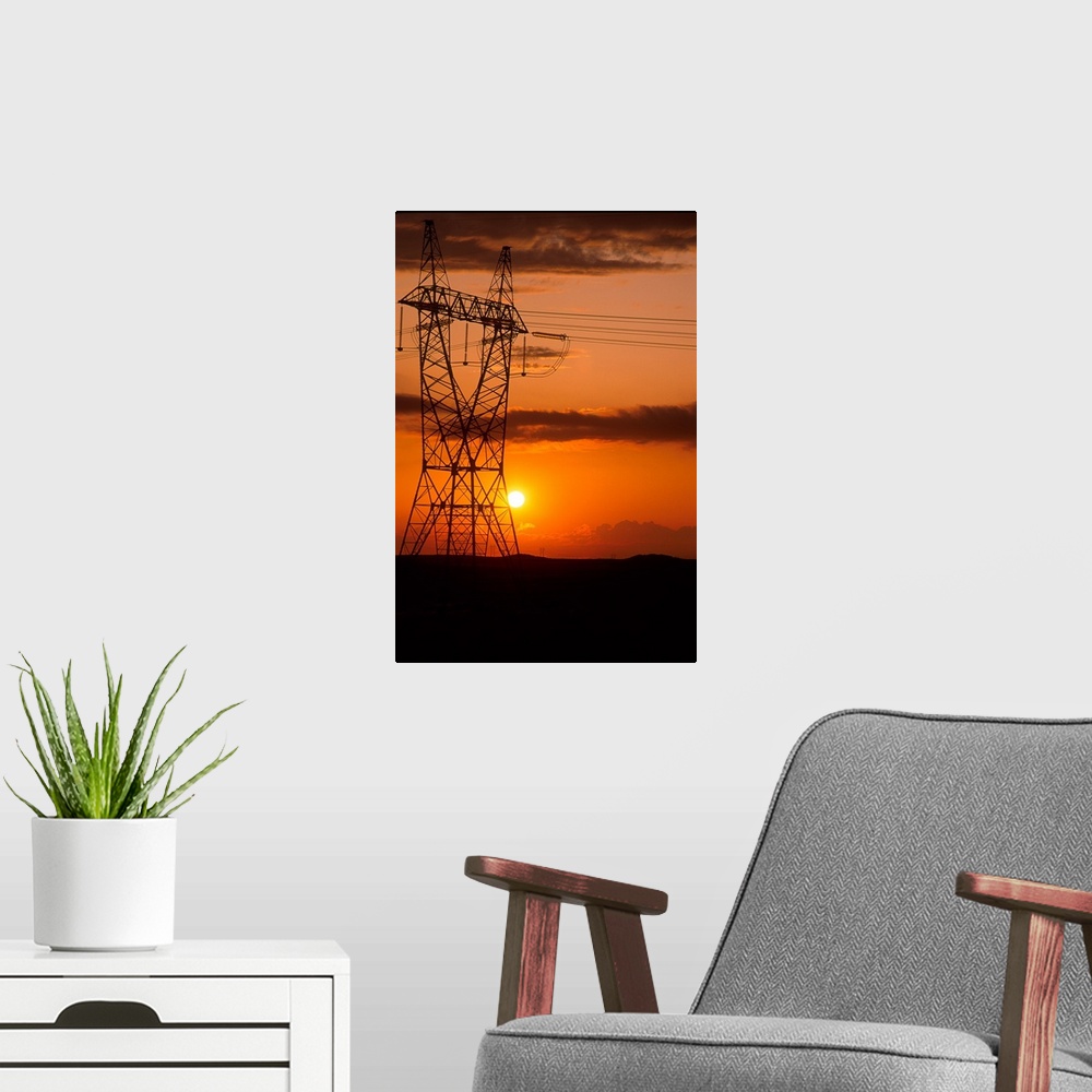 A modern room featuring Power lines at sunset