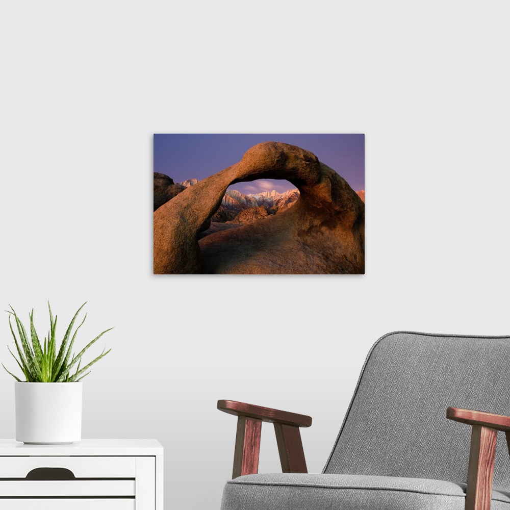 A modern room featuring Pre-Dawn View of Mount Whitney through the Alabama Hills Mobius Arch.