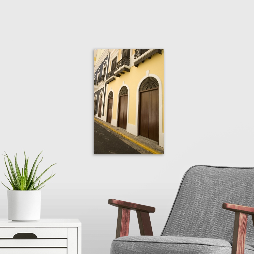 A modern room featuring Caribbean, Puerto Rico, Old San Juan.  Traditional architecture with arched doors and wrought-iro...