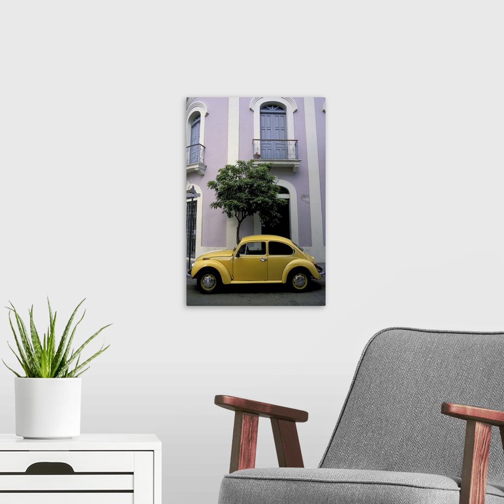 A modern room featuring Puerto Rico, Ponce, Historic District. 19th century pink and white house with yellow VW Beetle pa...