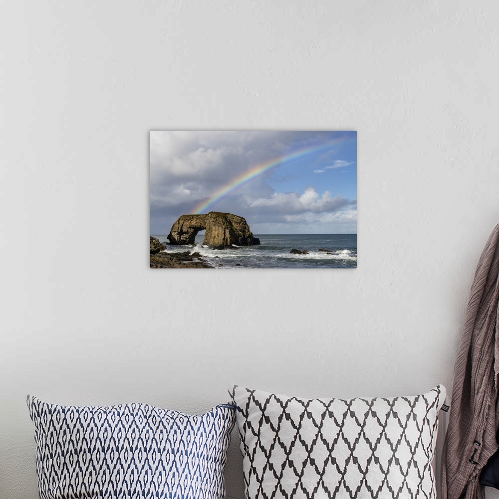 A bohemian room featuring Rainbow over The Great Pollet Sea Arch in County Donegal, Ireland.