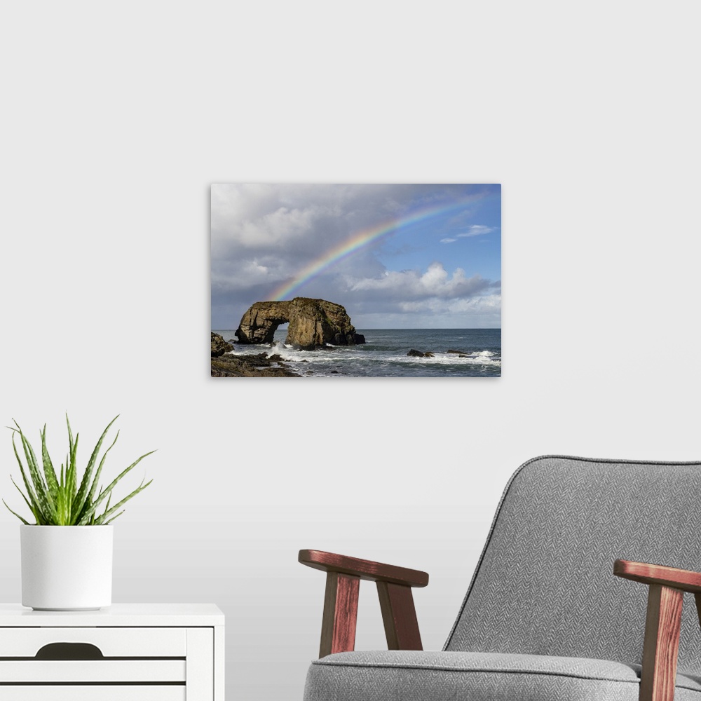 A modern room featuring Rainbow over The Great Pollet Sea Arch in County Donegal, Ireland.