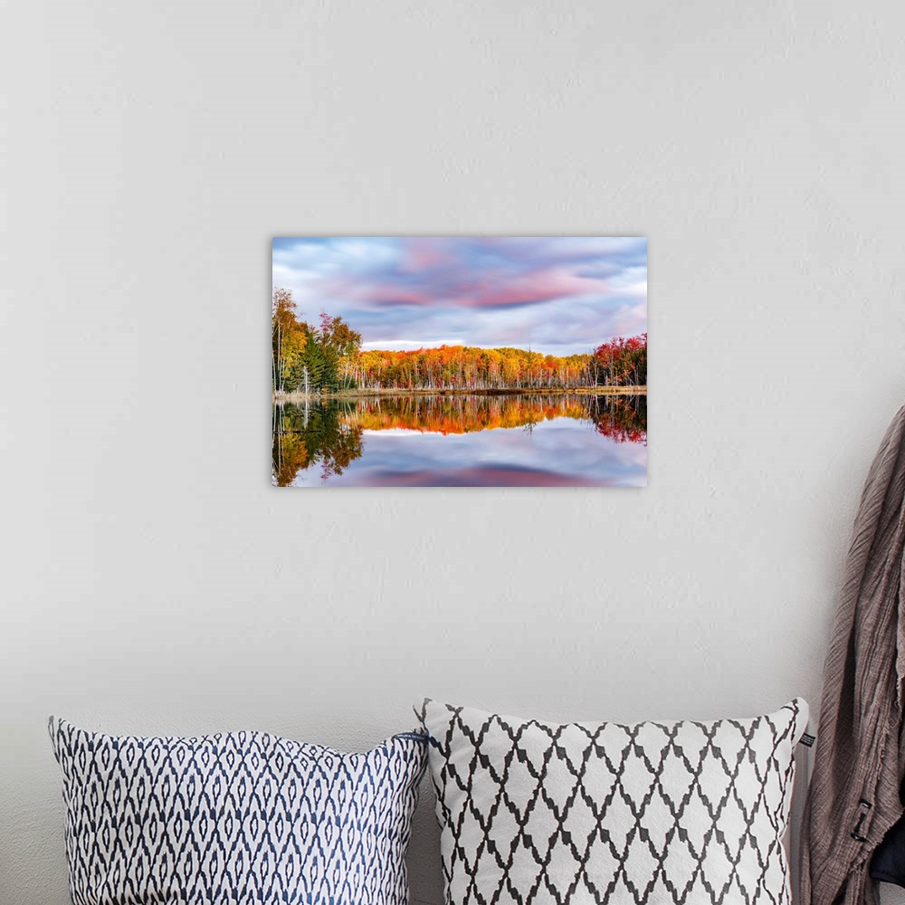 A bohemian room featuring Red Jack Lake and sunrise reflection, Alger County, Upper Peninsula of Michigan.