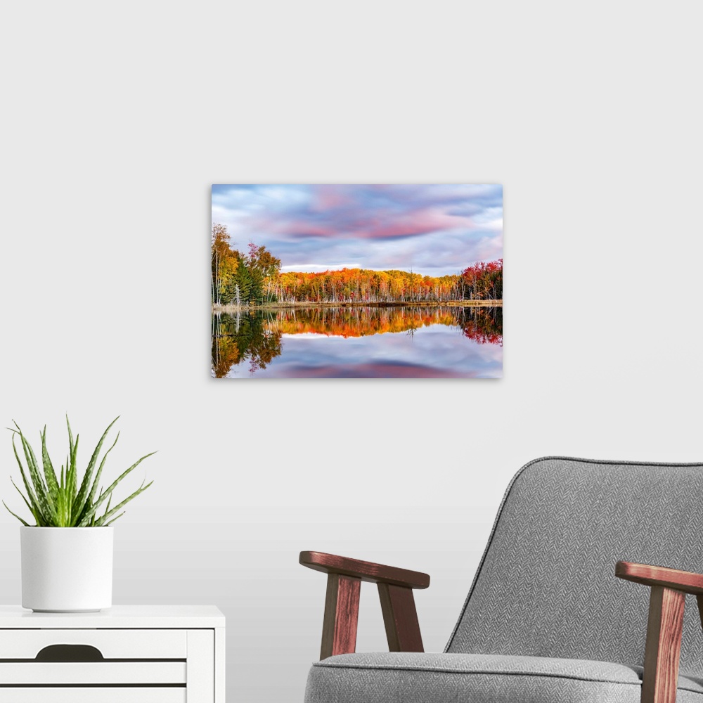 A modern room featuring Red Jack Lake and sunrise reflection, Alger County, Upper Peninsula of Michigan.