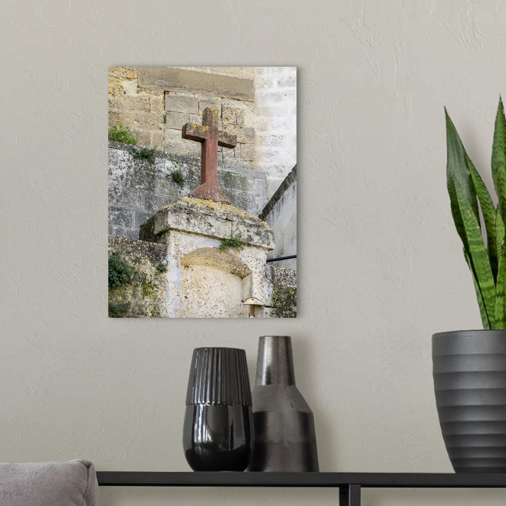 A modern room featuring Red stone cross in the old town of Matera.