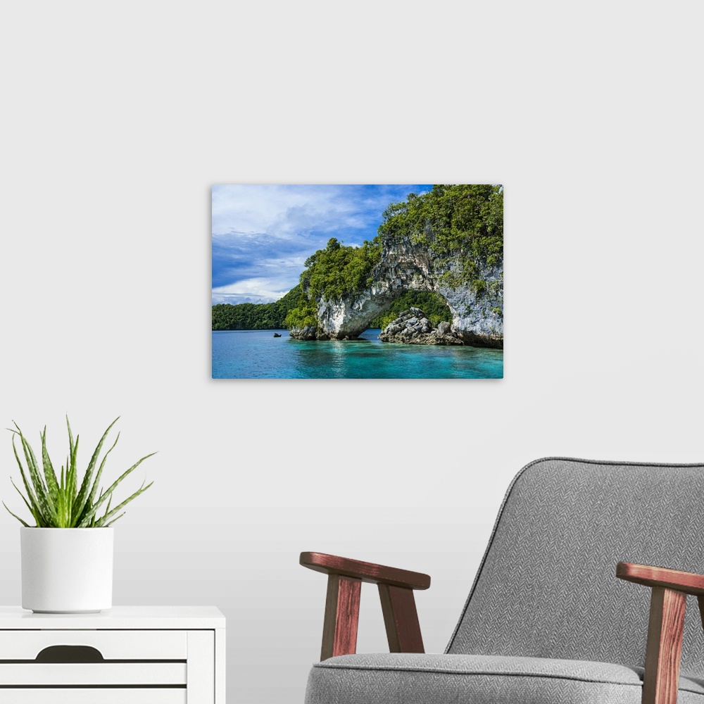 A modern room featuring Rock arch in the Rock Islands, Palau, Central Pacific.