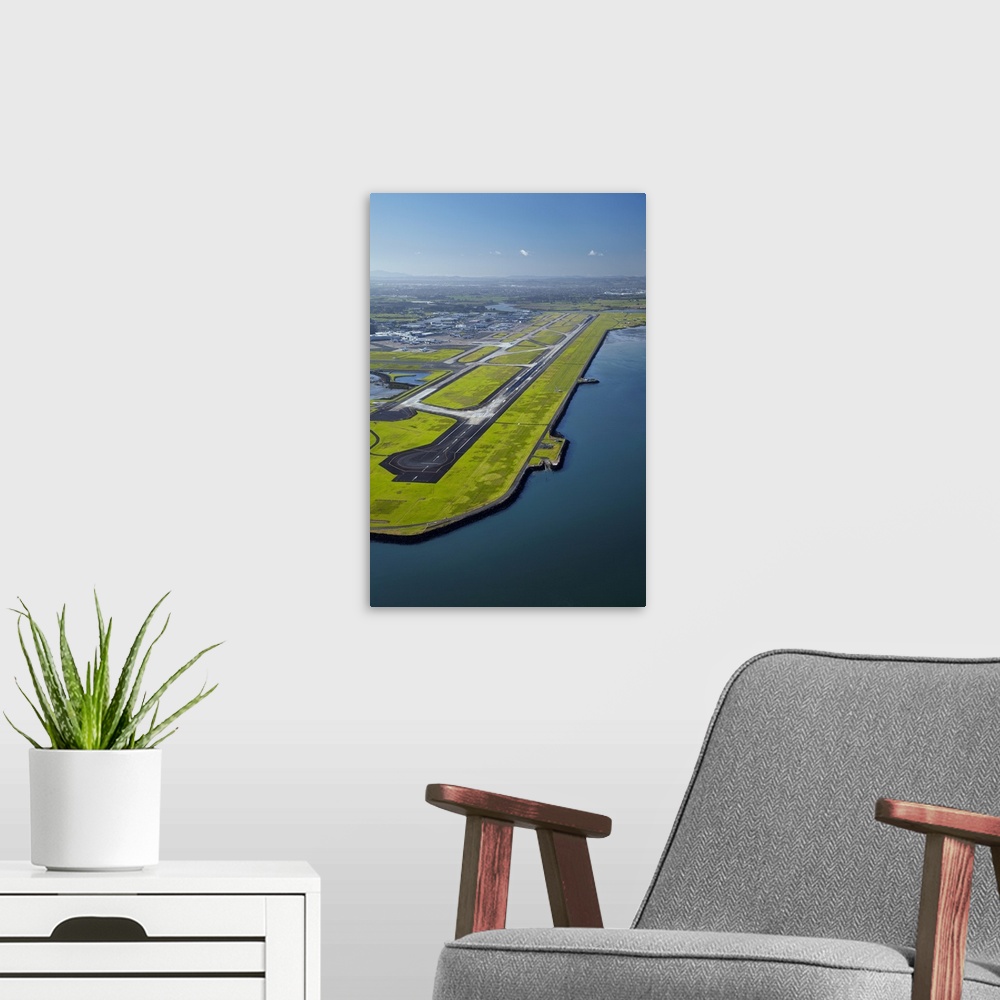 A modern room featuring Runway at Auckland Airport, and Manukau Harbour, North Island, New Zealand.