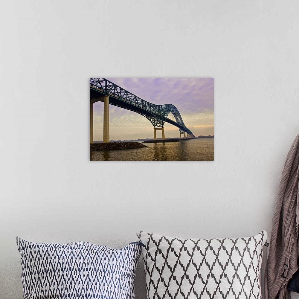 A bohemian room featuring Sailing down The St. Lawrence River towards Montreal under the Laviolette Bridge