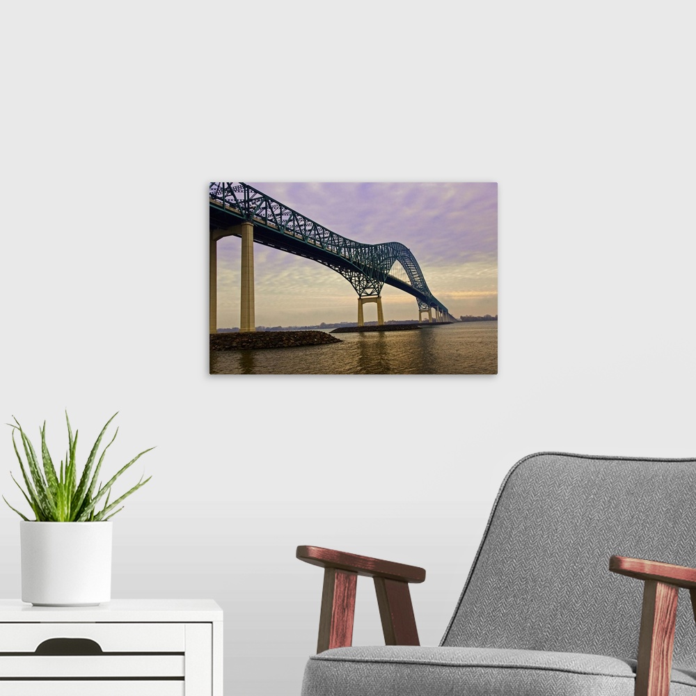 A modern room featuring Sailing down The St. Lawrence River towards Montreal under the Laviolette Bridge