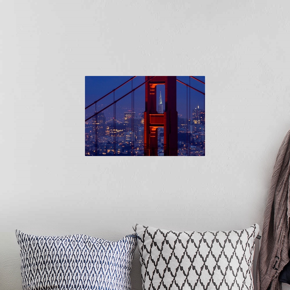 A bohemian room featuring A dusk view of San Francisco with the Transamerica building through the Golden Gate Bridge.