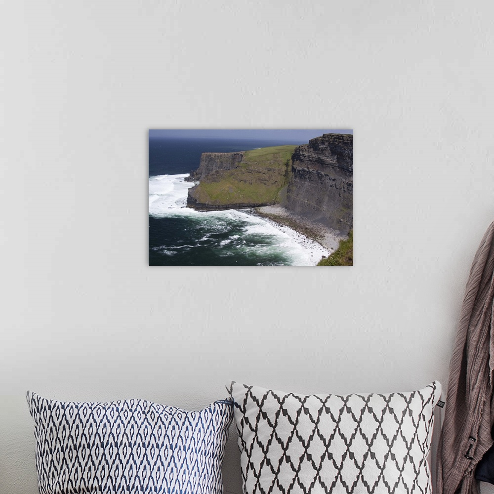 A bohemian room featuring Scenic Cliffs of Moher and beach with the Atlantic Ocean and choppy waves