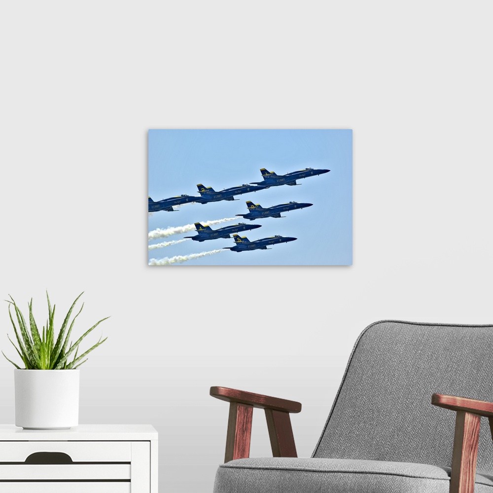 A modern room featuring Washington, Seattle, The Blue Angels, Navy precision flying team, six F/A-18 Hornet aircraft.