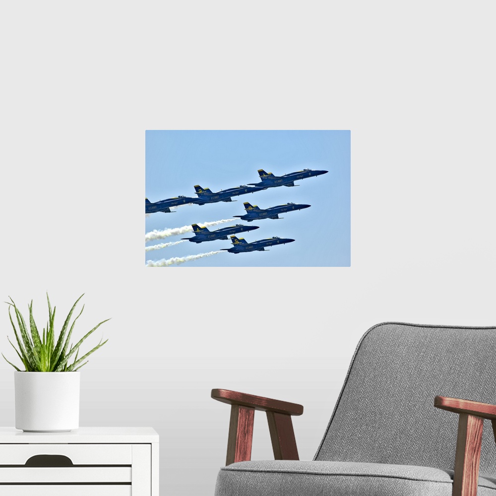 A modern room featuring Washington, Seattle, The Blue Angels, Navy precision flying team, six F/A-18 Hornet aircraft.