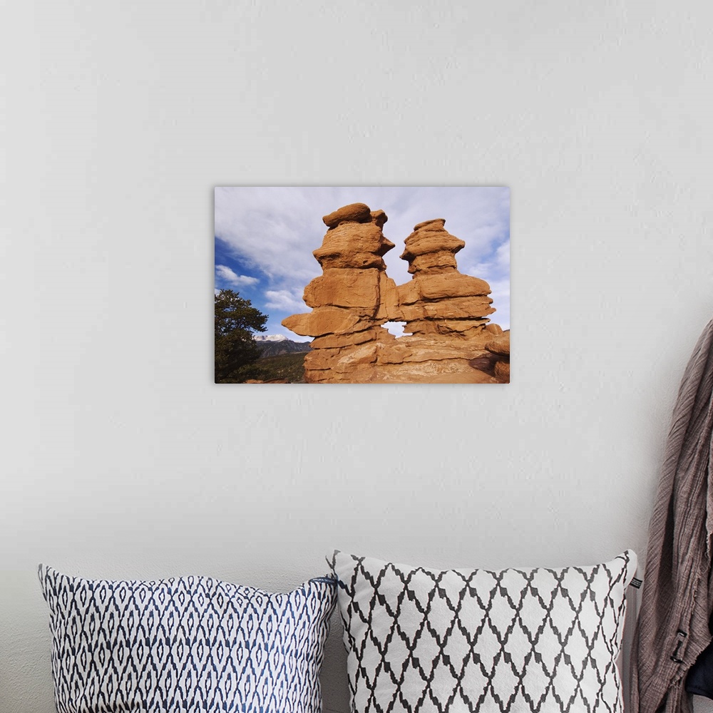 A bohemian room featuring Siamese Twins Rock formation and Pikes Peak, Garden of The Gods National Landmark, Colorado Sprin...