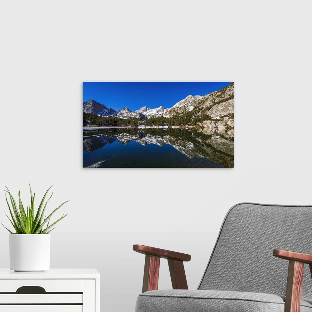 A modern room featuring Sierra peaks reflected in Long Lake, Little Lakes Valley, John Muir Wilderness, California, USA.