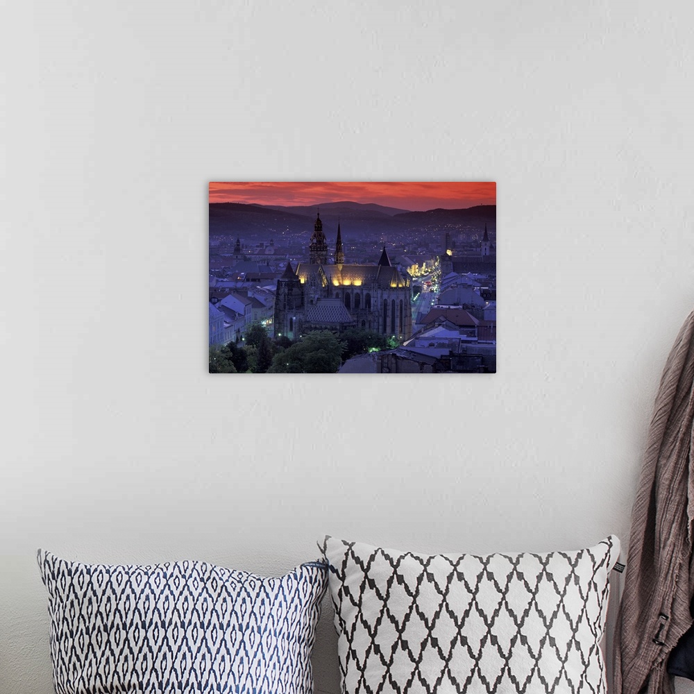 A bohemian room featuring Europe, Slovakia, Kosice. Cathedral of St. Elizabeth and town view at dusk