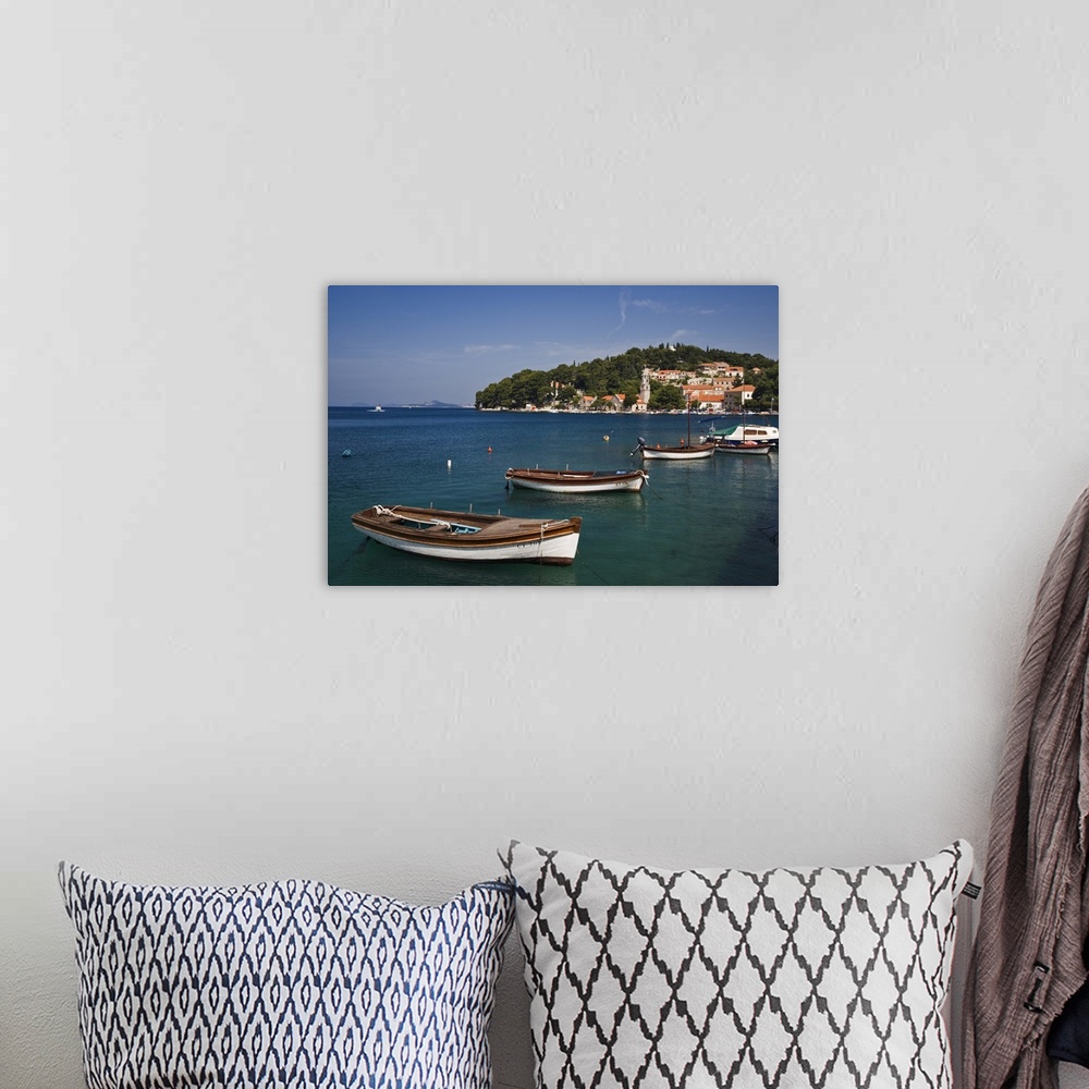 A bohemian room featuring Small boats docked in harbor, Hvar Island, one of the most famous Dalmatian Islands, Croatia