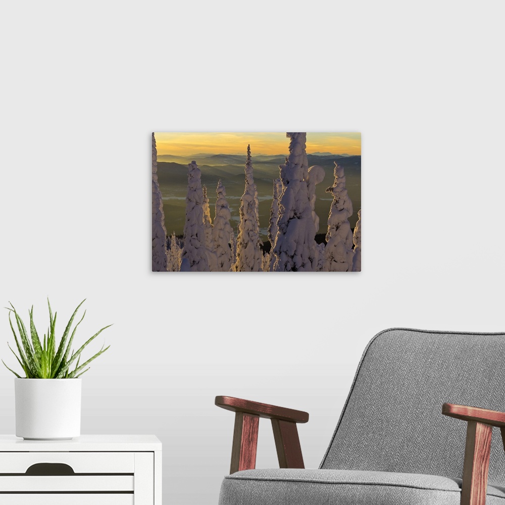 A modern room featuring Snowghosts at sunset looking west to the Salish Mountains from the summit of Big Mountain in Whit...