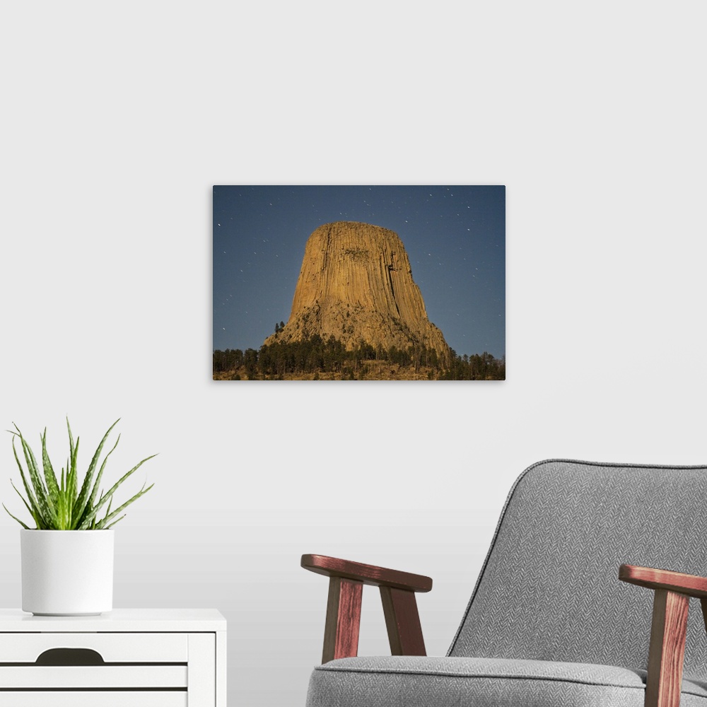 A modern room featuring Devils Tower National Monument, Wyoming. South Side of Devils Tower Photographed by Moonlight.