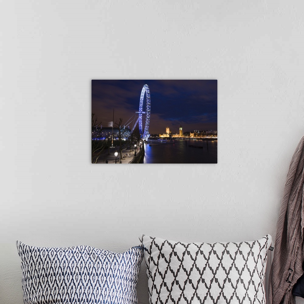 A bohemian room featuring ENGLAND-London:.Southbank-.The London Eye and Houses of Parliament -Evening