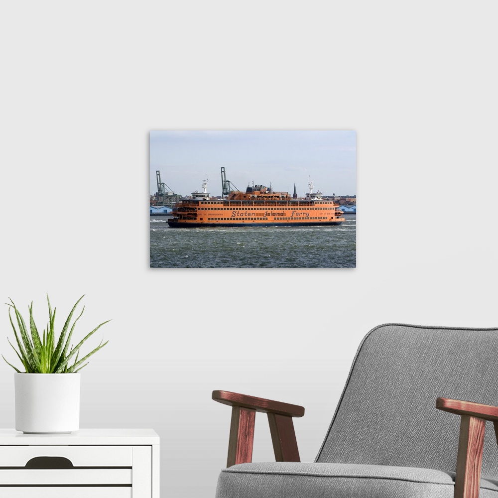 A modern room featuring Staten Island Ferry in the harbor at New York City, New York, USA.