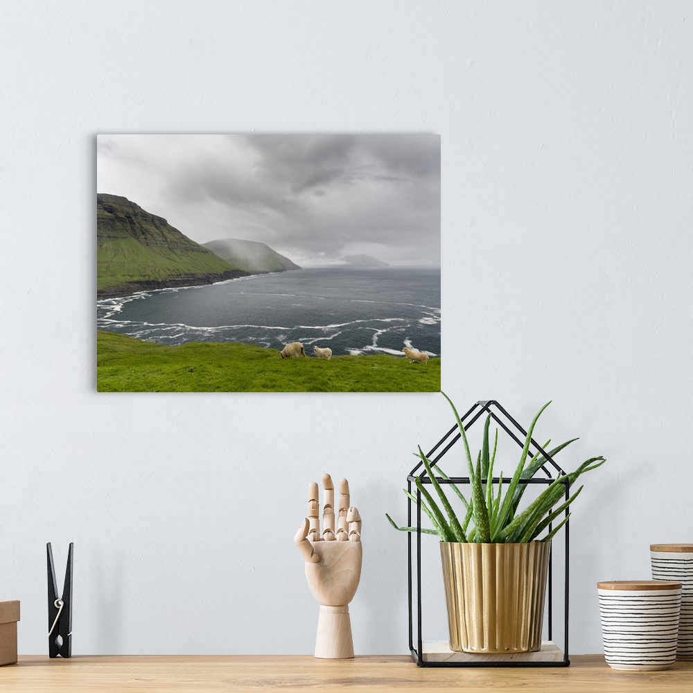 A bohemian room featuring The west coast at Nordradalur. The island Streymoy, one of the two large islands of the Faroe Isl...