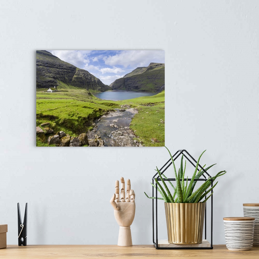 A bohemian room featuring The valley of Saksun, one of the main attractions of the Faroe Islands. The island Streymoy, one ...