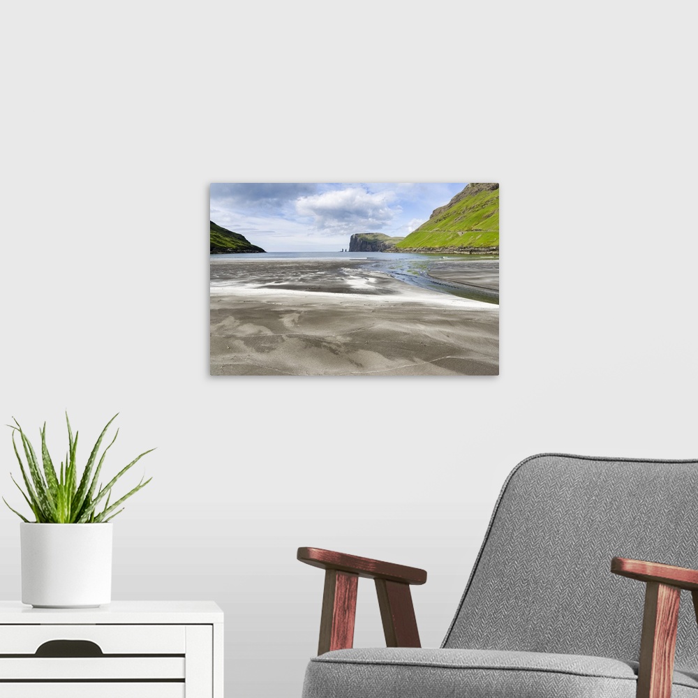 A modern room featuring Beach at Tjornuvik. In the background the island Eysturoy with the iconic sea stacks Risin and Ke...