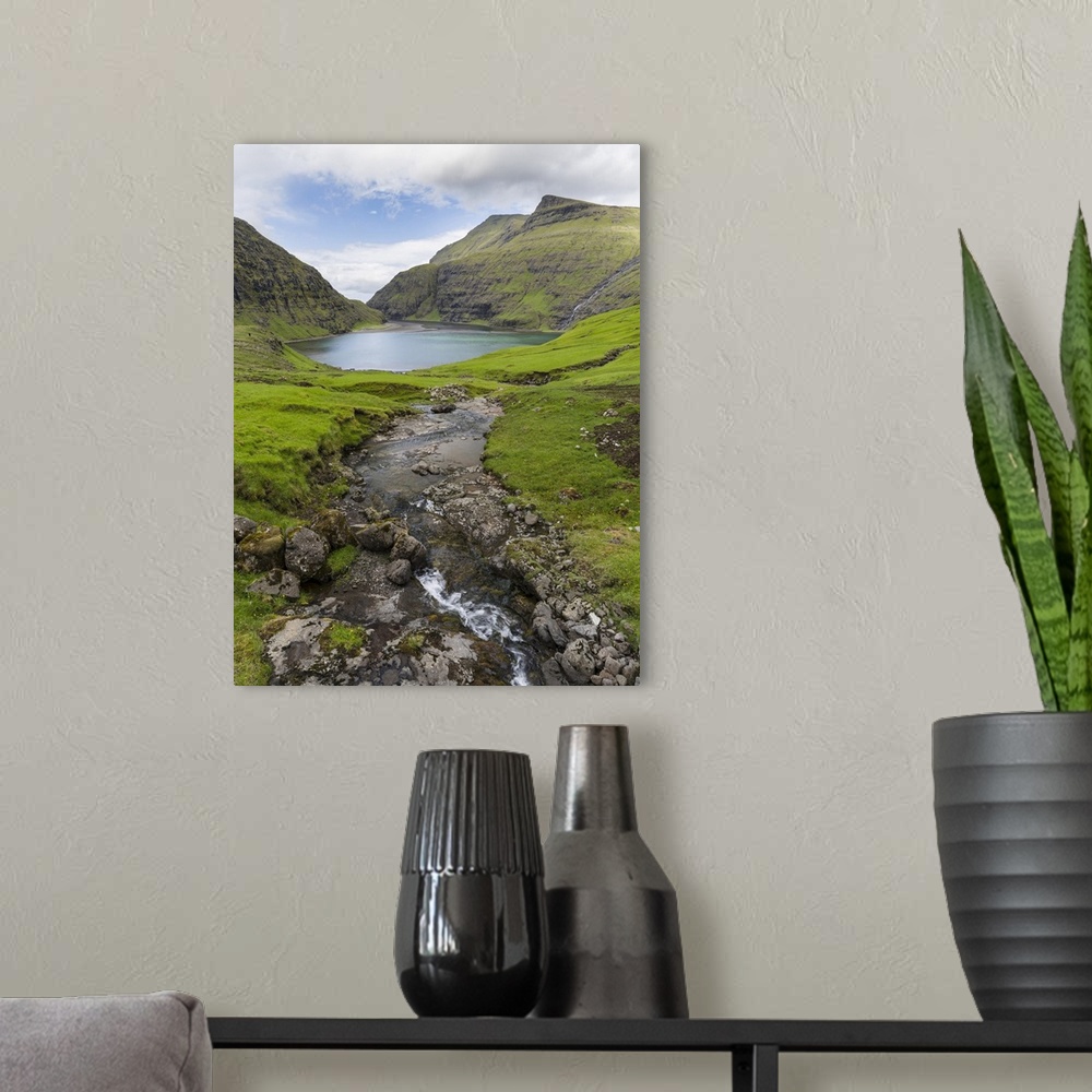A modern room featuring The valley of Saksun, one of the main attractions of the Faroe Islands. The island Streymoy, one ...