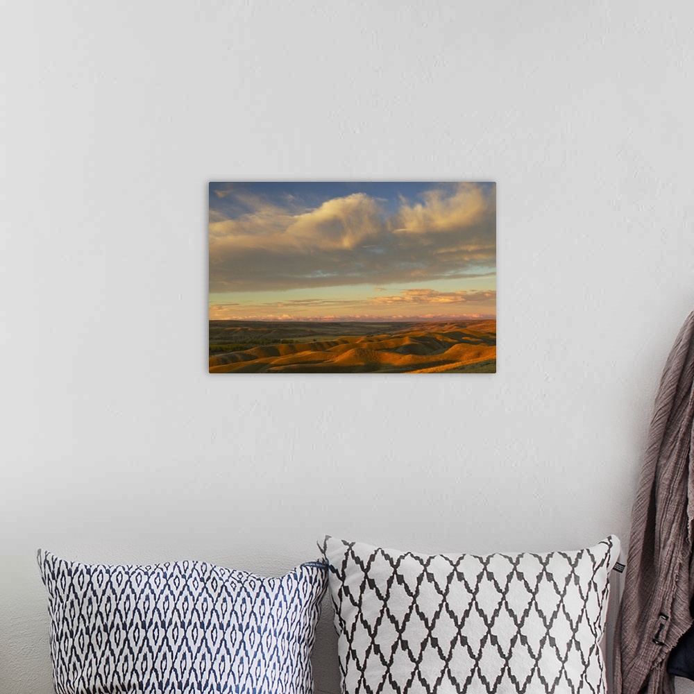 A bohemian room featuring Sunrise clouds over Marias River State Park near Etheridge, Montana, USA