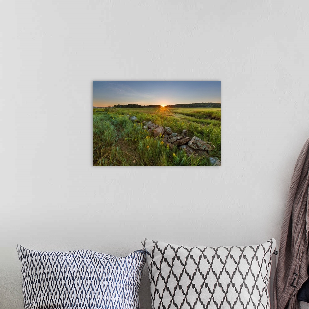 A bohemian room featuring Sunrise over the salt marsh along the Essex River at the Cox Reservation in Essex, Maassachusetts.