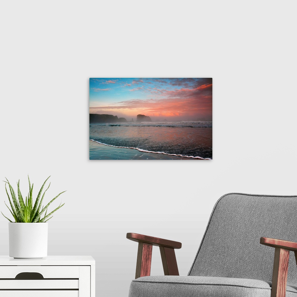 A modern room featuring Sunrise, sea stacks, Bandon, Oregon, USA