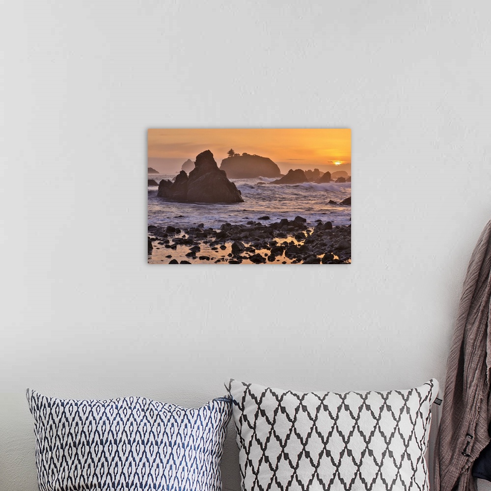 A bohemian room featuring Sunset and sea stacks along Northern California coastline, Crescent City