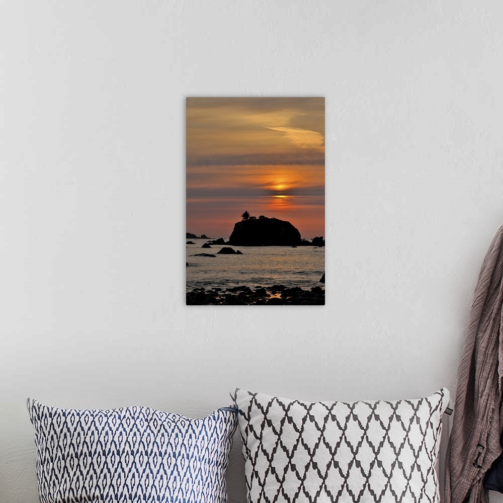A bohemian room featuring Sunset and sea stacks along the Northern California coastline, Crescent City