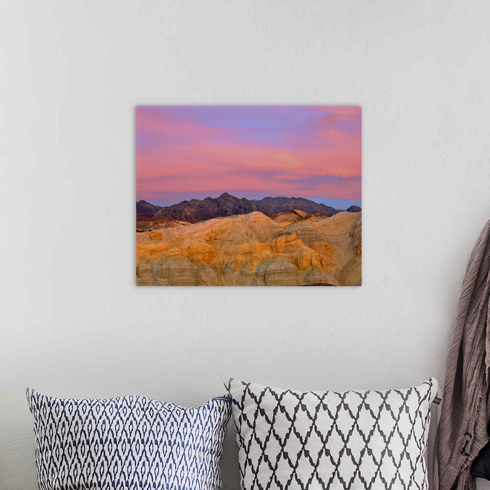 A bohemian room featuring California, Death Valley National Park. Sunset colors the sky with vibrant pink and purple in Dea...
