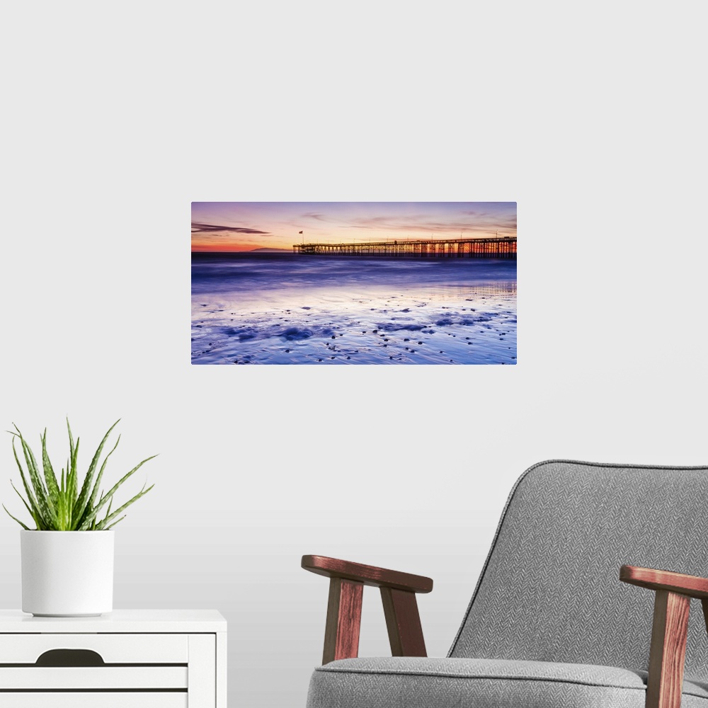 A modern room featuring Sunset over the Channel Islands and Ventura Pier from San Buenaventura State Beach, Ventura, Cali...