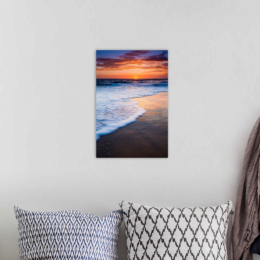 A bohemian room featuring Sunset over the Pacific Ocean from Ventura State Beach, Ventura, California USA.