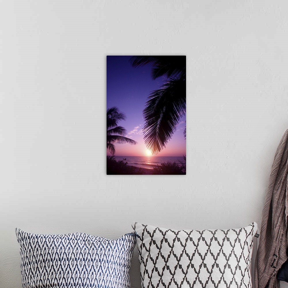 A bohemian room featuring Sunset West End, Cayman Brac, Cayman Islands, Caribbean.
