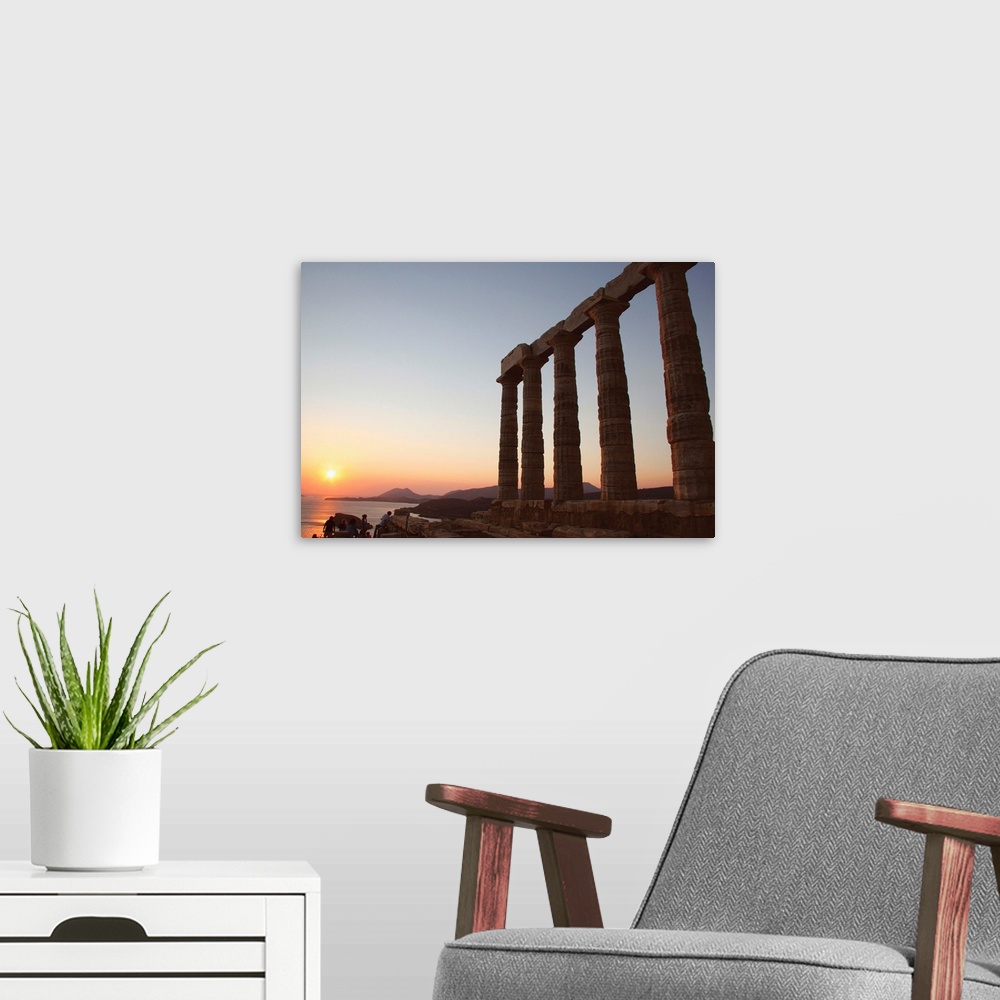 A modern room featuring Greek Art. Temple of Poseidon. Doric style. Was built in the 5th century BC. Sunset. Cape Sounion...