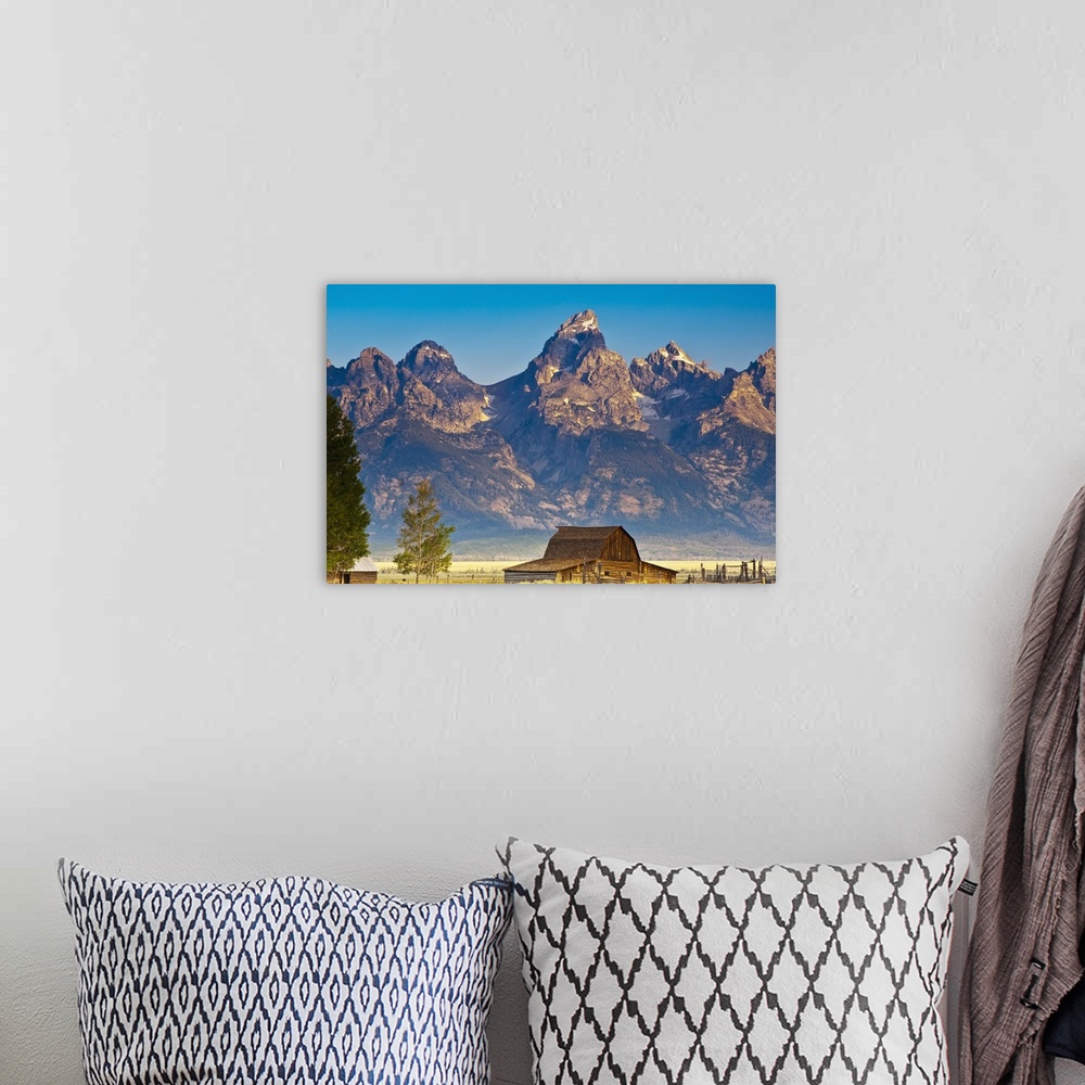 A bohemian room featuring Teton Front Range and Mormon Barn at Sunrise, Grand Teton National Park, Wyoming.