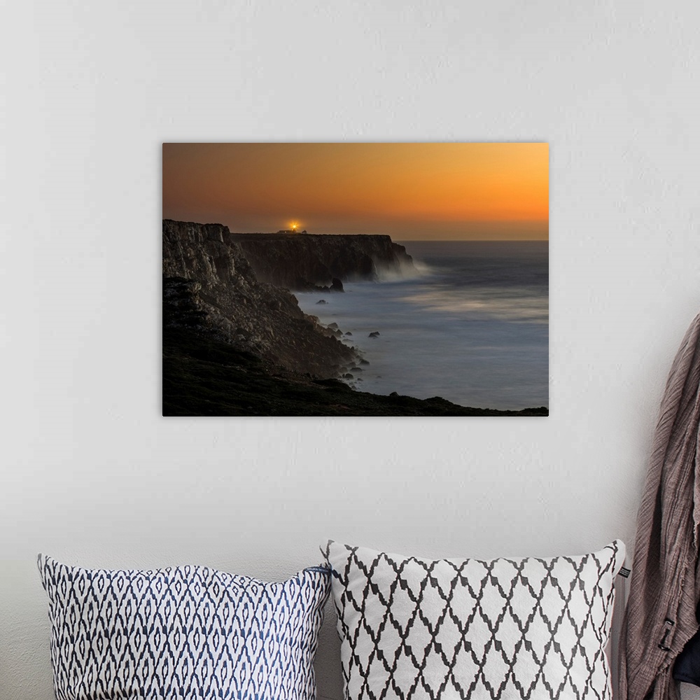 A bohemian room featuring Cabo de Sao Vincente (Cape St. Vincent) with its lighthouse at the rocky coast of the Algarve in ...