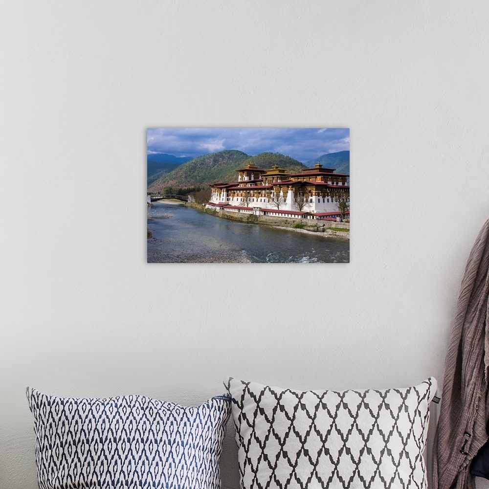 A bohemian room featuring The dzong or castle of Punakha, Bhutan, Asia.