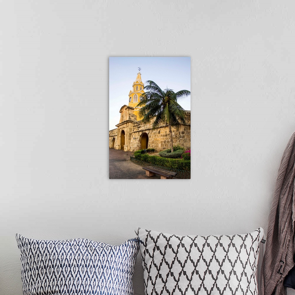 A bohemian room featuring South America, Colombia, Cartagena, The famed Clock Tower, Torre de Reloj, rises prominently in h...