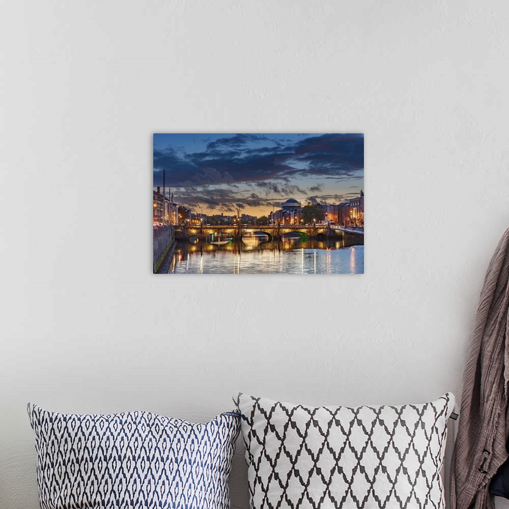 A bohemian room featuring The Grattan bridge over the river Liffey at dusk in downtown Dublin, Ireland.