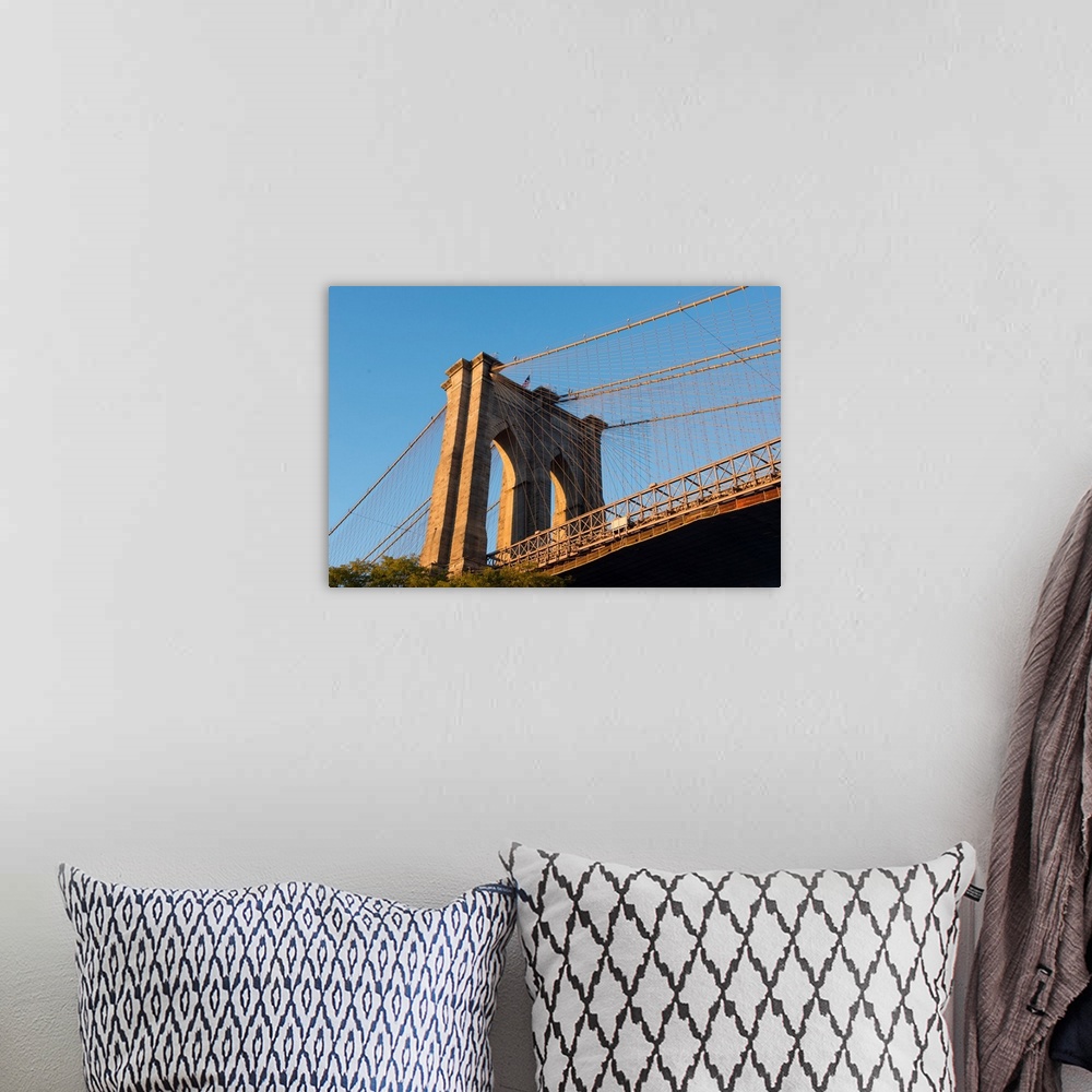 A bohemian room featuring The south tower of the iconic Brooklyn Bridge, New York City, New York