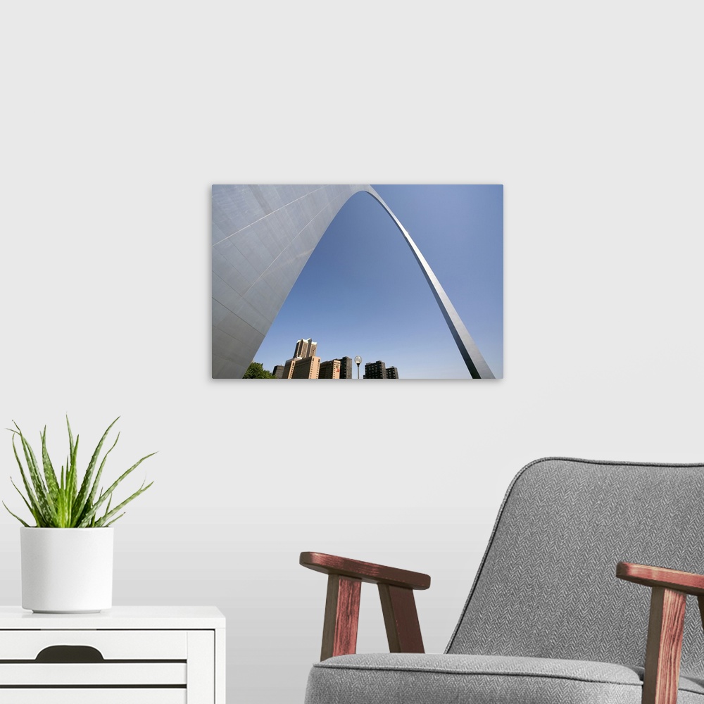 A modern room featuring USA, Missouri, St. Louis. The St. Louis, Missouri, skyline is drawfed by the Gateway Arch, part o...