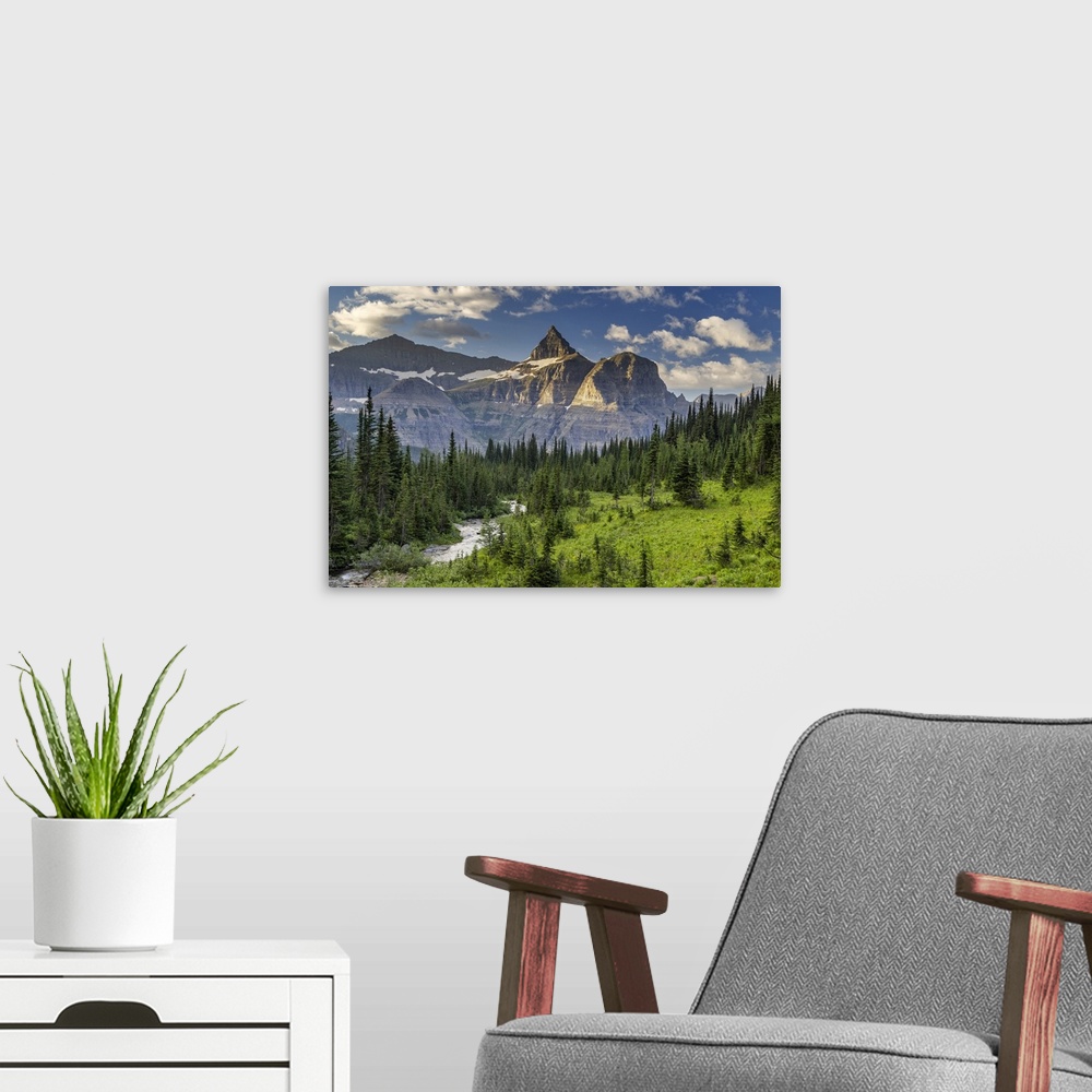 A modern room featuring Thunderbird Mountain over Hole in the Wall Creek in Glacier National Park, Montana, USA.
