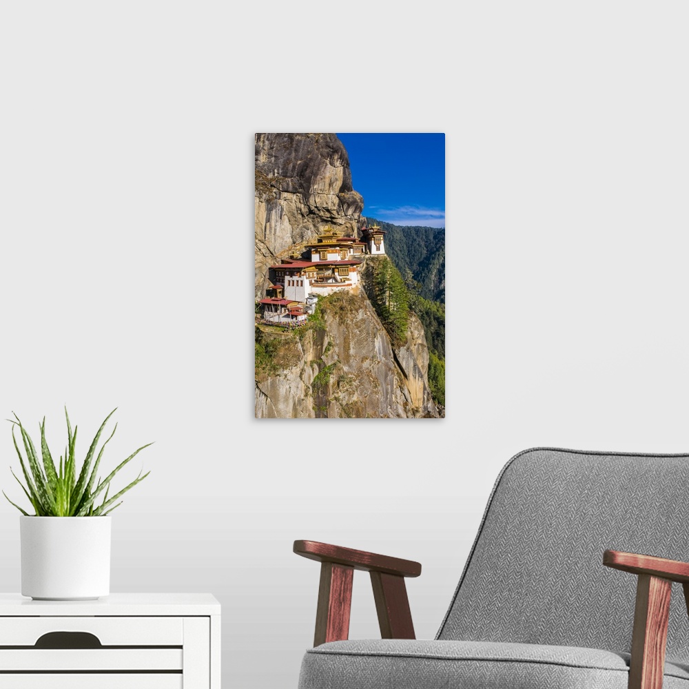A modern room featuring Tiger-Nest, Taktsang Goempa monastery hanging in the cliffs, Bhutan.